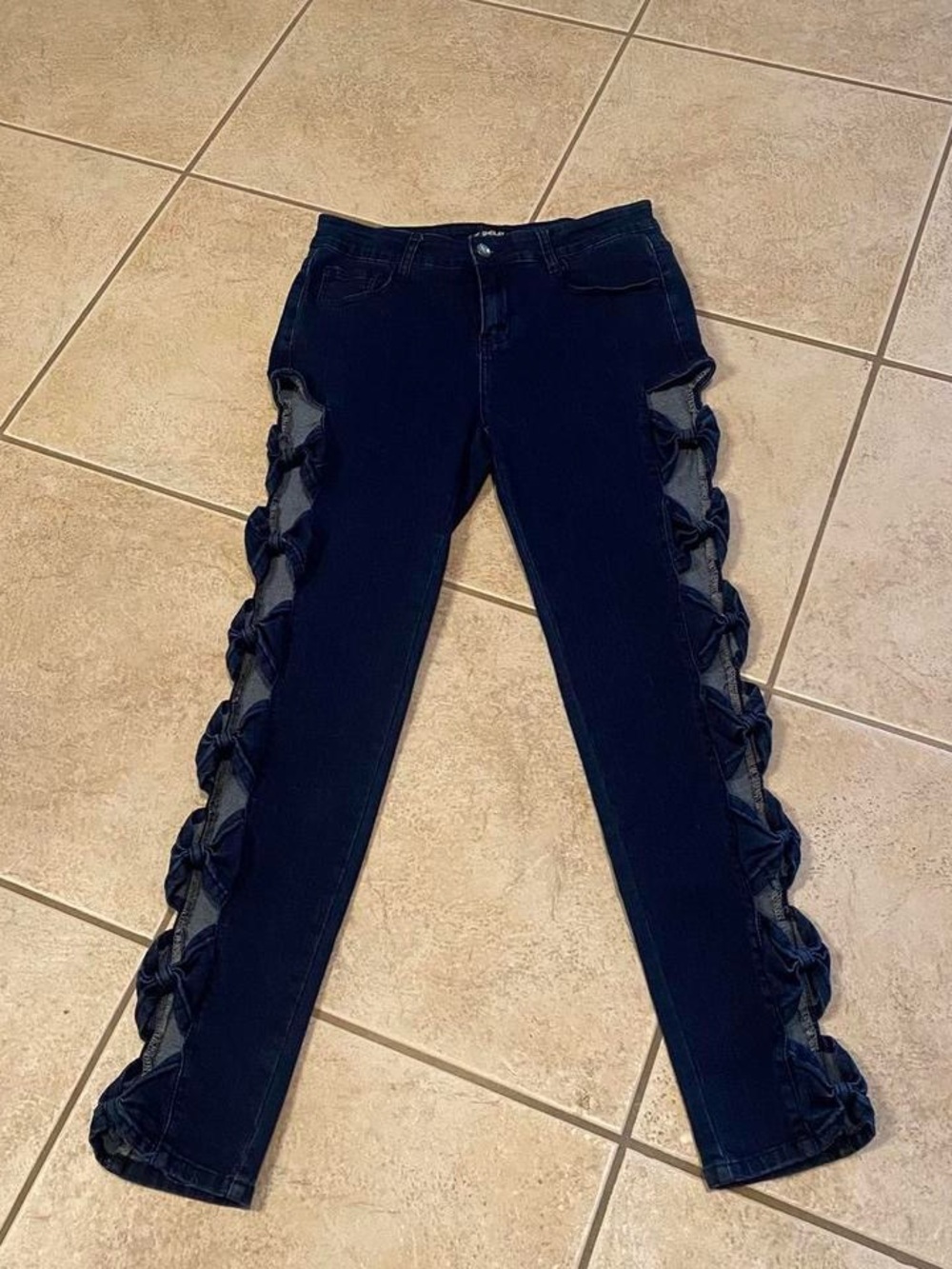 Women's Dark Navy Straight-Leg Jeans with Side cutout bows on Trim. So cute.